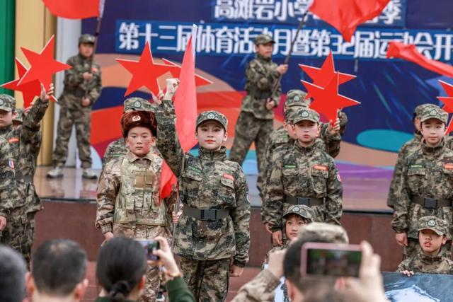 沙坪坝区高滩岩小学第十三届运动月暨第32届春季田径运动会开幕式燃情九游体育启幕(图2)