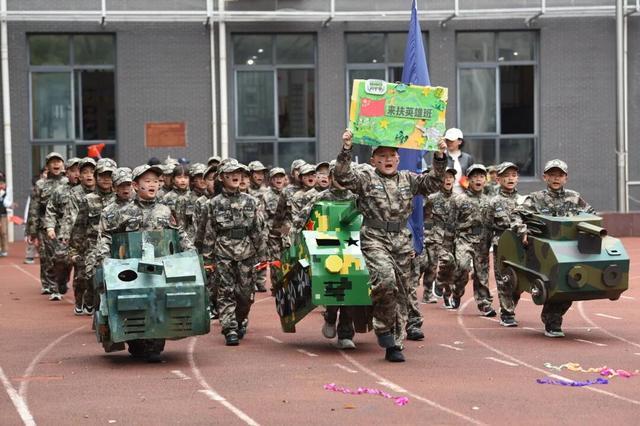 沙坪坝区高滩岩小学第十三届运动月暨第32届春季田径运动会开幕式燃情九游体育启幕(图1)